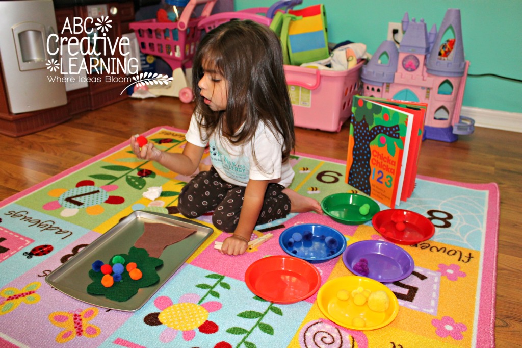 Exploring colors sizes, numbers, and fine motor skills