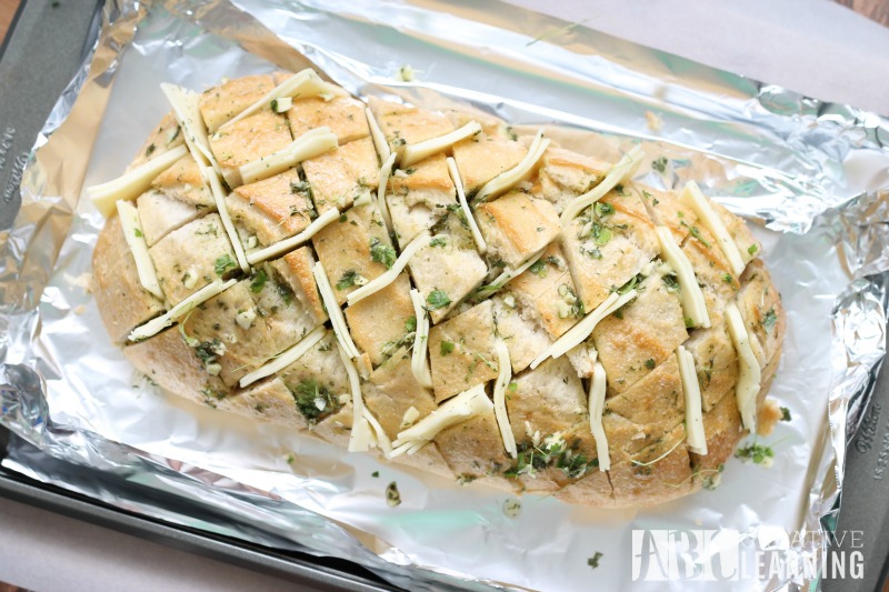 Easy Cheesy Garlic Pull Apart Bread and NESTLÉ® STOUFFER’S® Family Size Entreés prep