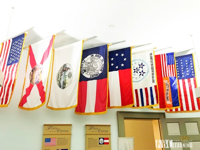 Family Travels To Florida Historic Capitol Museum flags