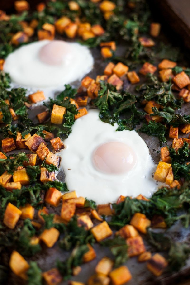 SHEET PAN BAKED EGGS WITH SWEET POTATOES, KALE, & CILANTRO-PEPITA PESTO